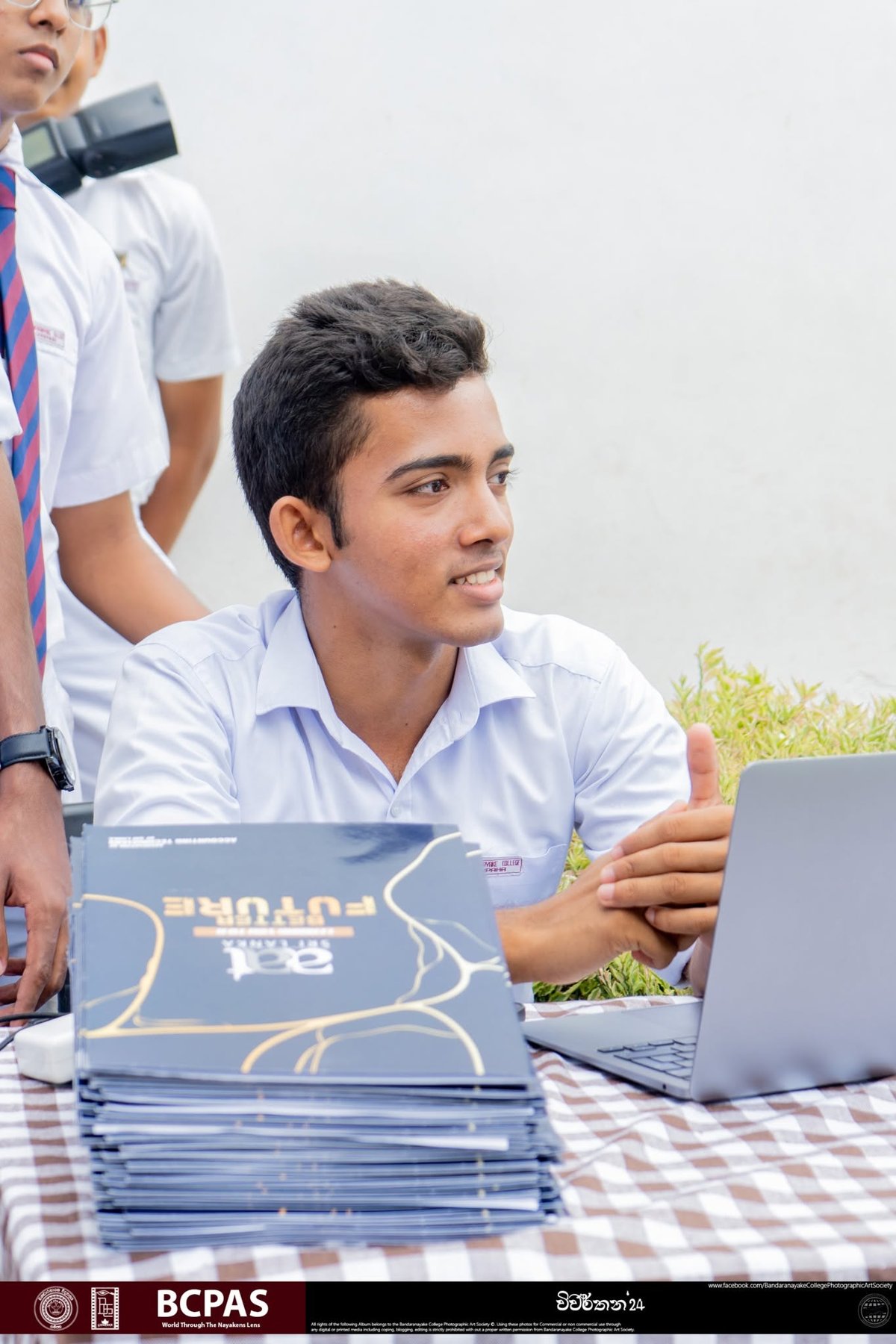 Volunteer at the desk — Vivarthana 2024